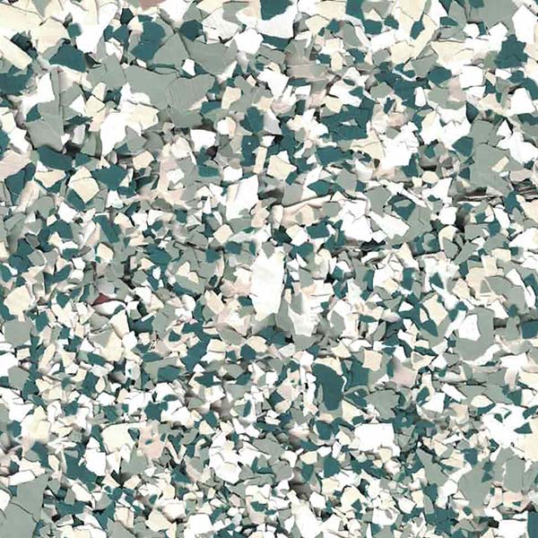 This image shows a collection of irregularly shaped fragments in different shades of teal, grey, and white, resembling broken pieces of material clustered together.