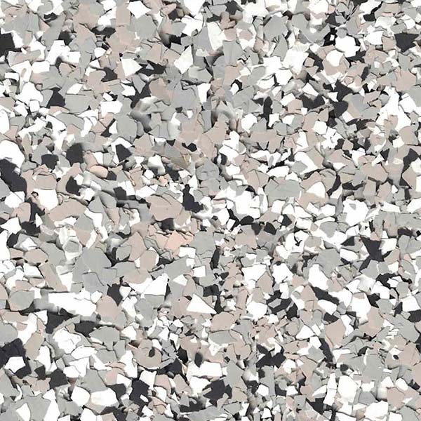 The image shows a speckled pattern of variously sized, jagged shapes in shades of black, white, and gray, resembling a terrazzo floor design.