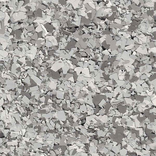 The image shows an array of fragmented, broken pieces in different shades of gray, resembling crushed stone or shattered materials clustered together.