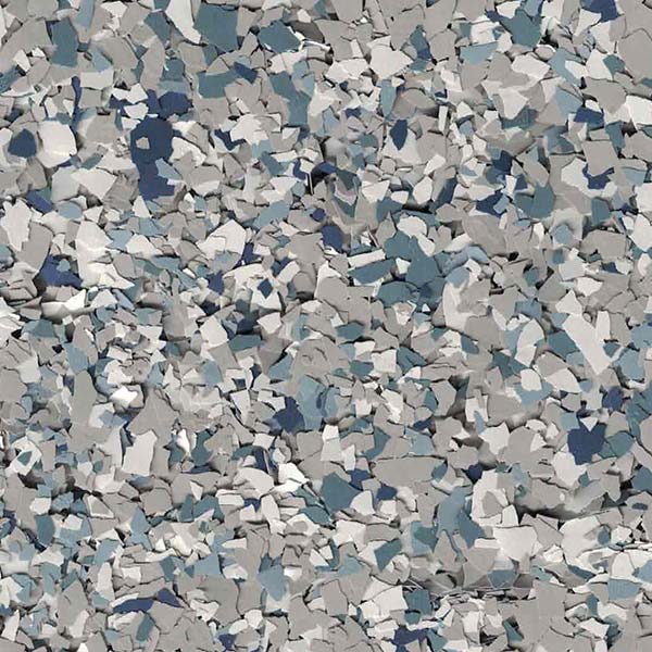 The image shows a textured pattern of crushed and fragmented shapes in various shades of gray, white, and blue, resembling a pile of stones or rubble.