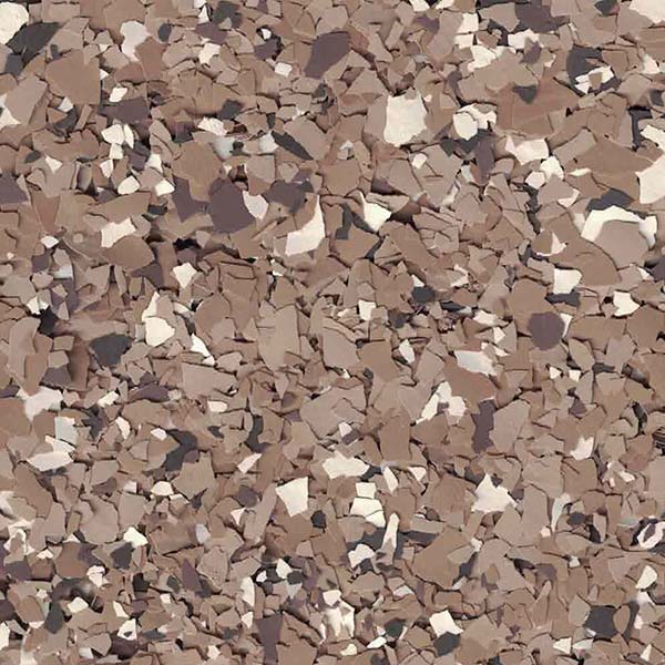 The image displays an array of irregularly shaped pieces in shades of brown, beige, white, and black, resembling a fragmented pattern or speckled surface.