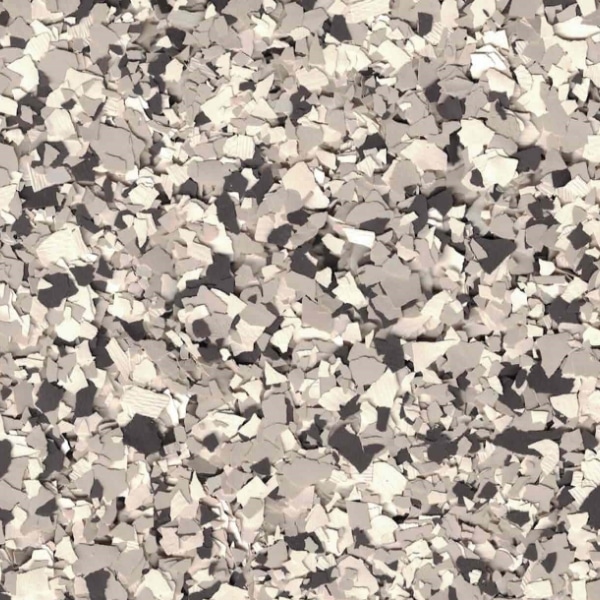 The image displays a random, chaotic collection of fragmented shapes in various shades of brown and gray, resembling a textured, abstract mosaic pattern.