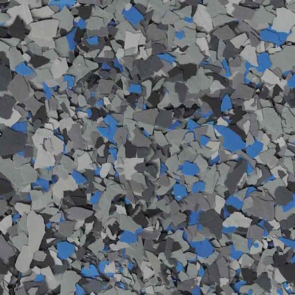 This image displays an abstract collection of irregular shapes in various shades of gray and blue, resembling a pile of scattered, colored fragments.